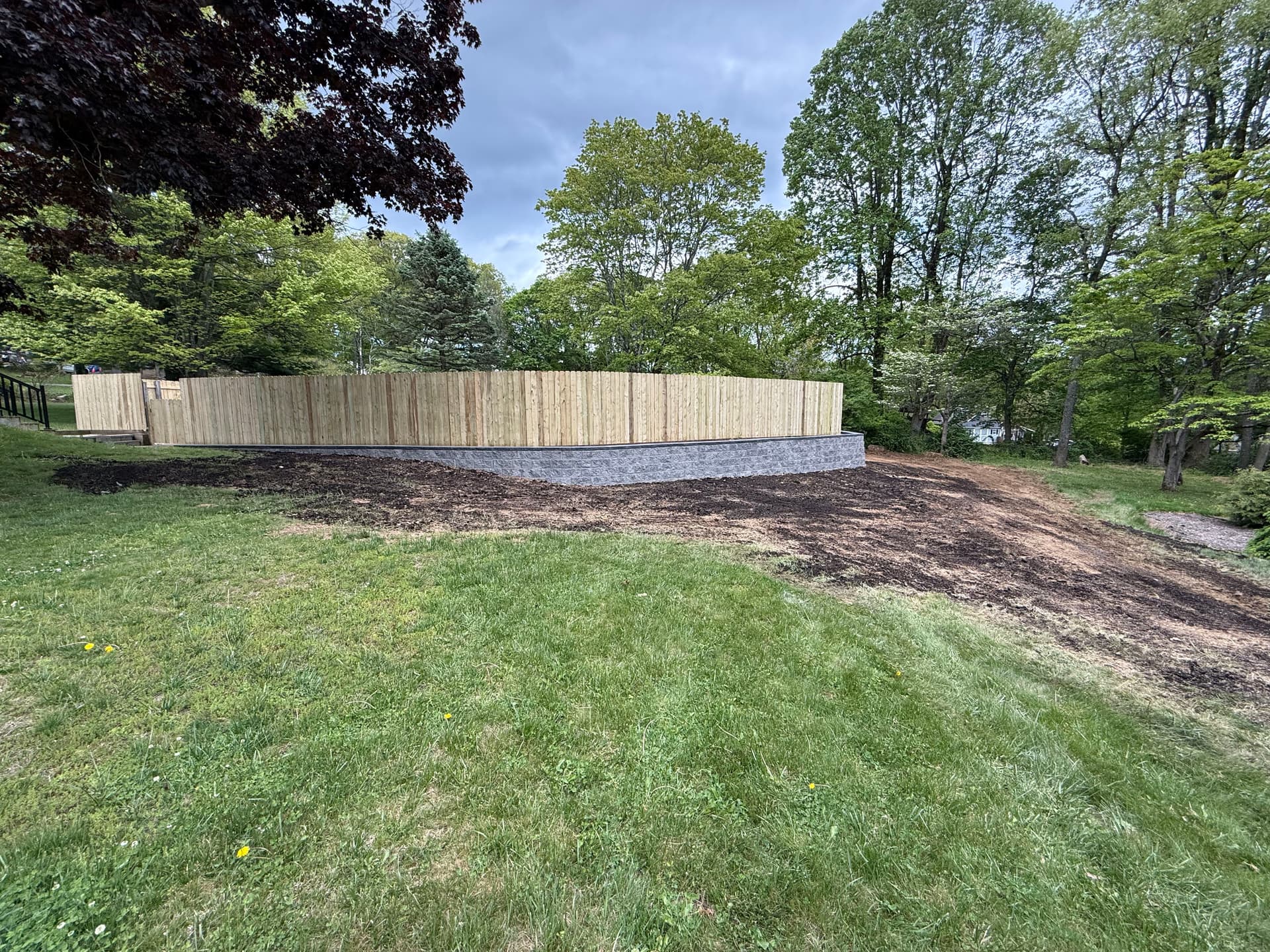 260-Foot Retaining Wall and Fence Replacement for Pool Area