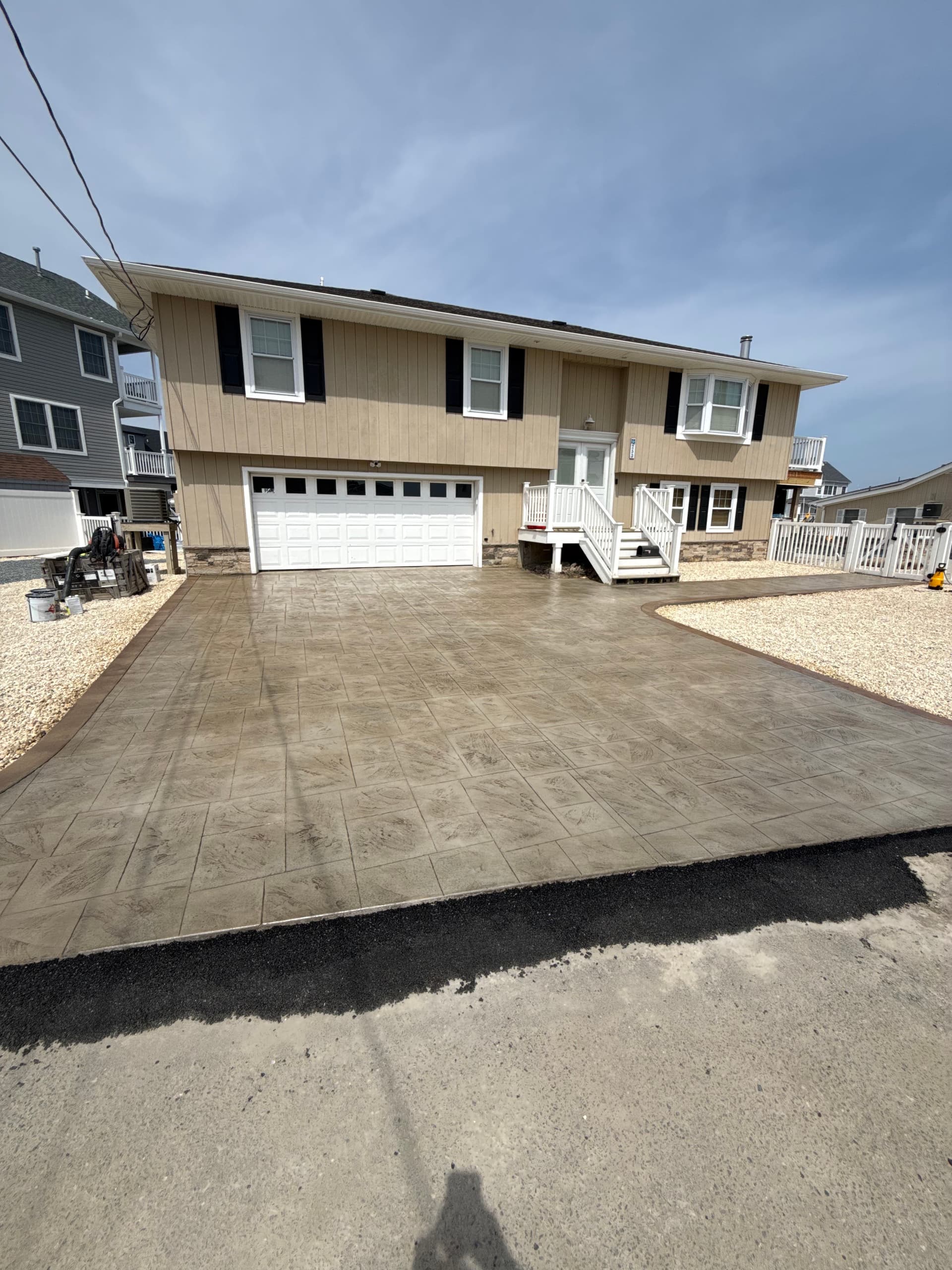 1,005 Sq Ft Stamped Concrete Driveway Built to Last