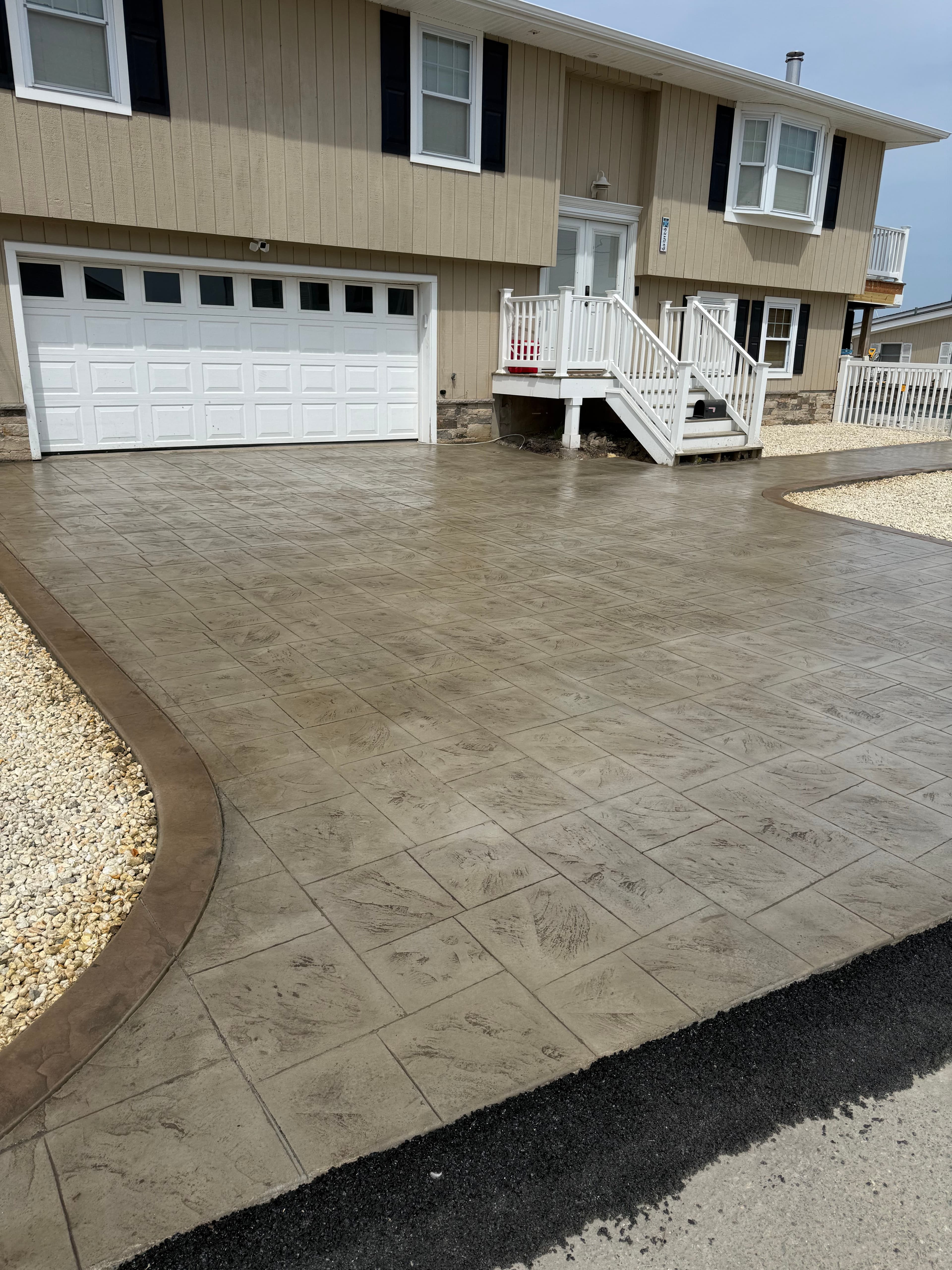 Project 1,005 Sq Ft Stamped Concrete Driveway Built to Last image