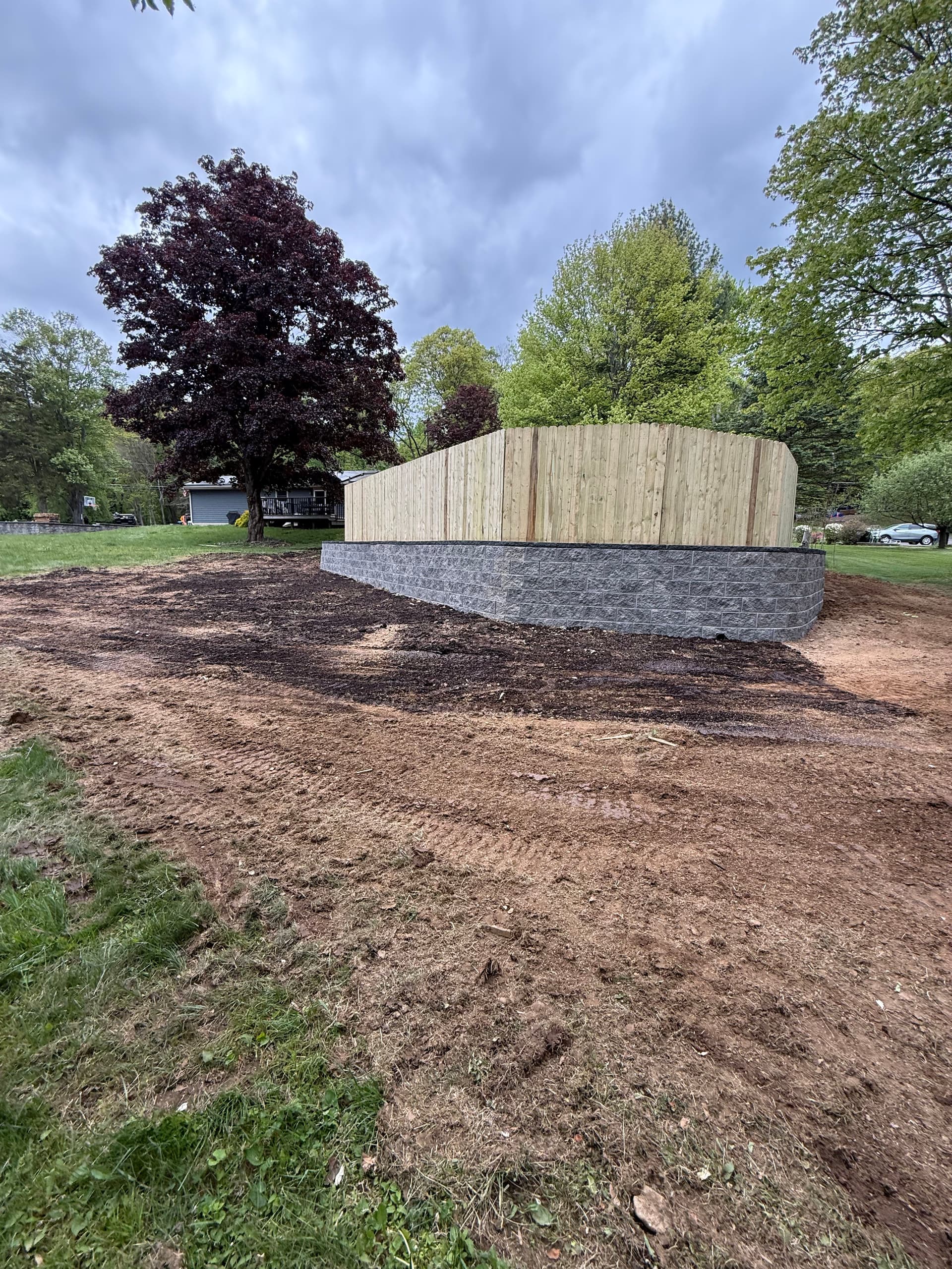 260-Foot Retaining Wall and Fence Replacement for Pool Area