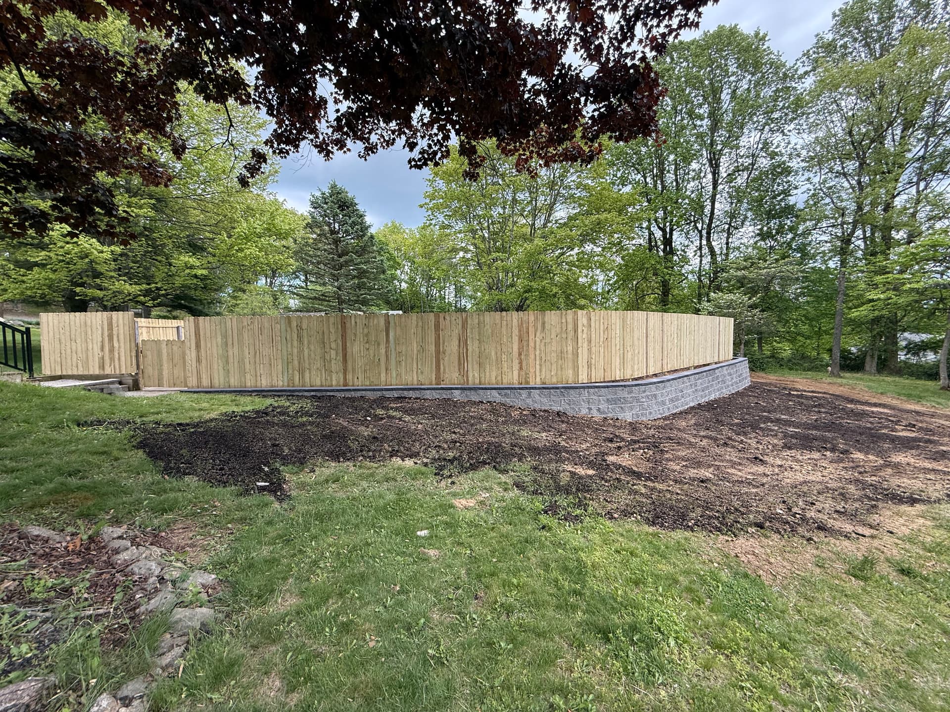 260-Foot Retaining Wall and Fence Replacement for Pool Area